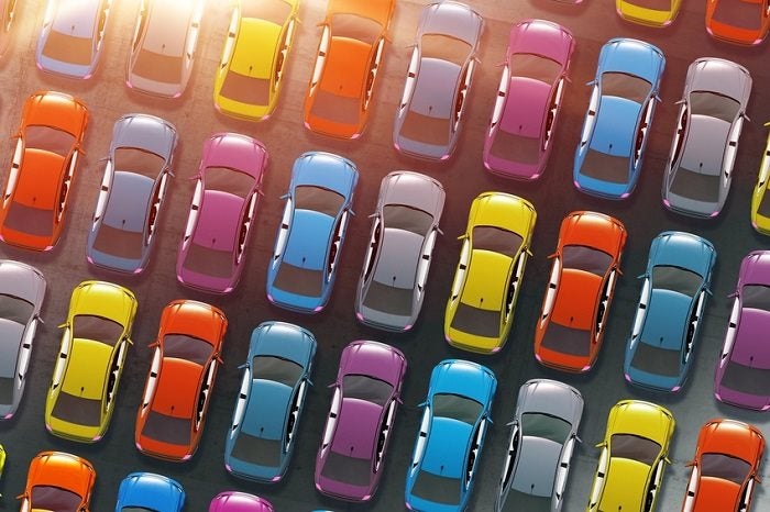 Row of bright used cars at dealership